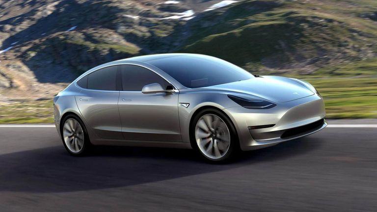 Tesla Ramps Up Model 3 Production First Car Rolls Off Null