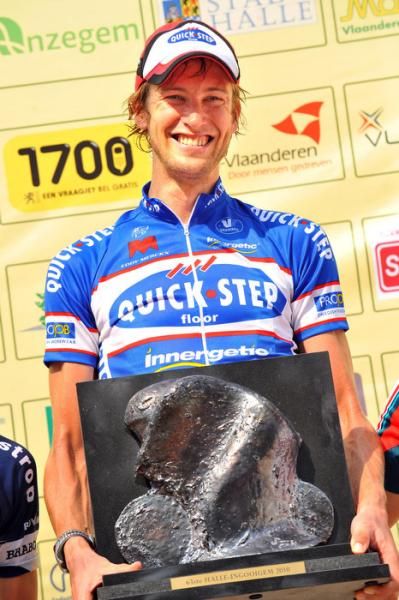 Jurgen Van De Walle (Quick Step) shows off the latest addition to his trophy collection.