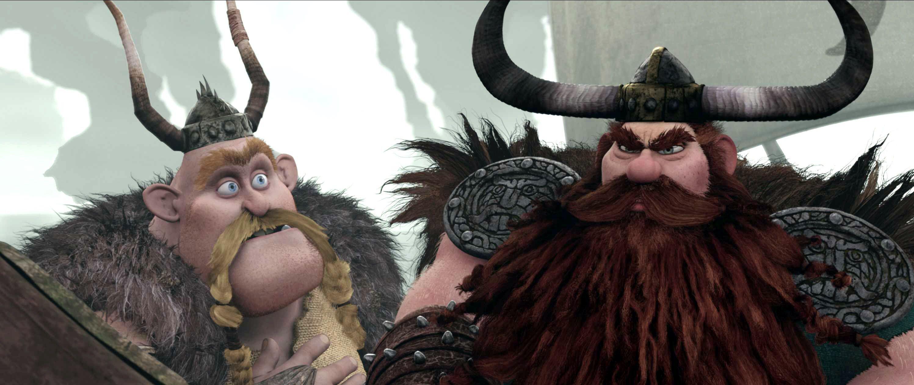an image from the 2010 original how to train your dragon movie showing stoic and gobber with viking helmets