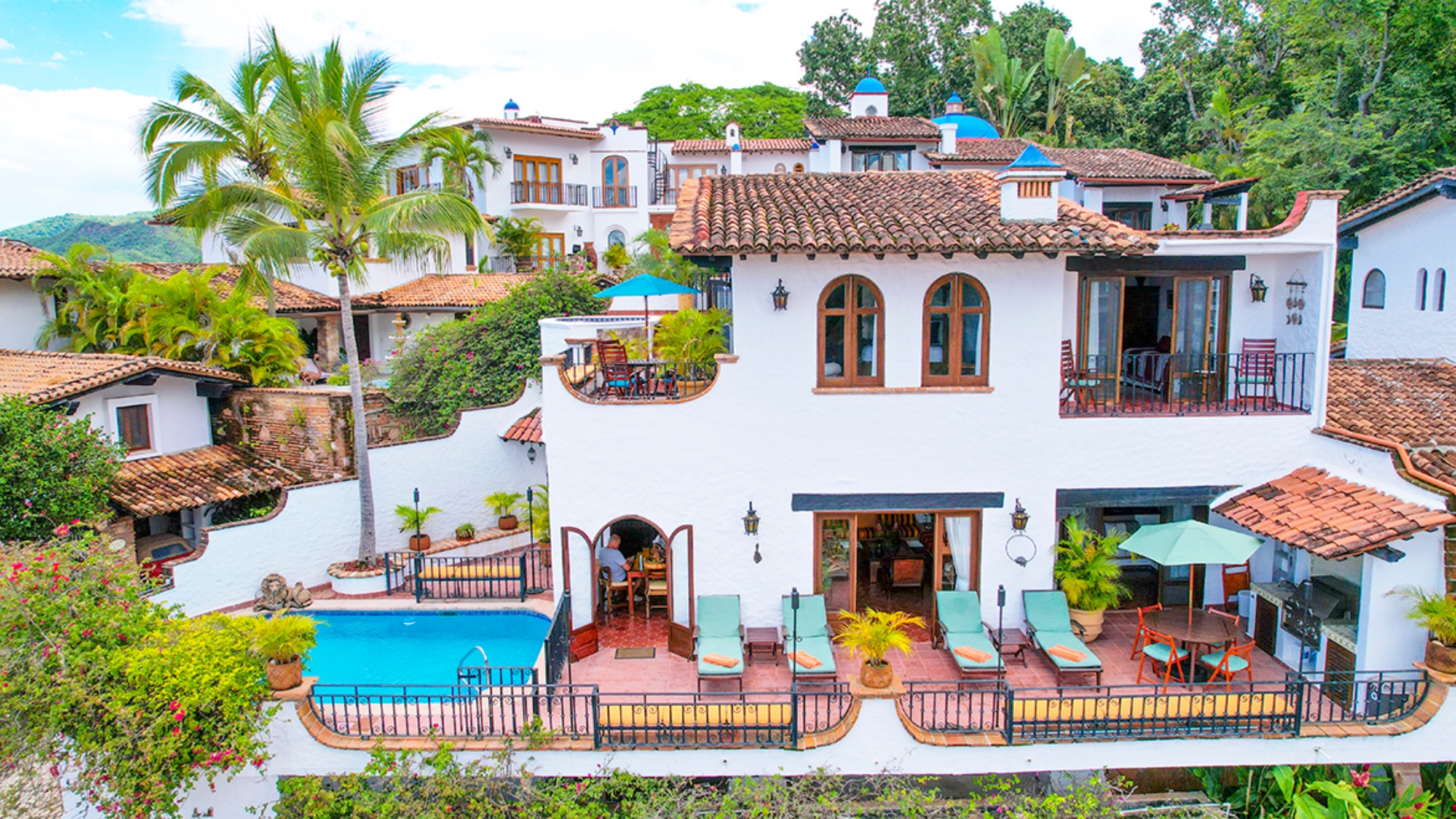 Puerto Vallarta, Jalisco This Spanish Colonial Revival villa in a coastal vacation destination is on a hillside with ocean views.