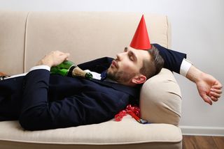 Man asleep with alcohol