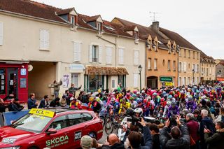 The pack of riders pictured at the start of the first stage of 83th edition of the Paris-Nice cycling race, from and to Le Perray-en-Yvelines (156,5km), Sunday 09 March 2025. BELGA PHOTO DAVID PINTENS (Photo by DAVID PINTENS / BELGA MAG / Belga via AFP)