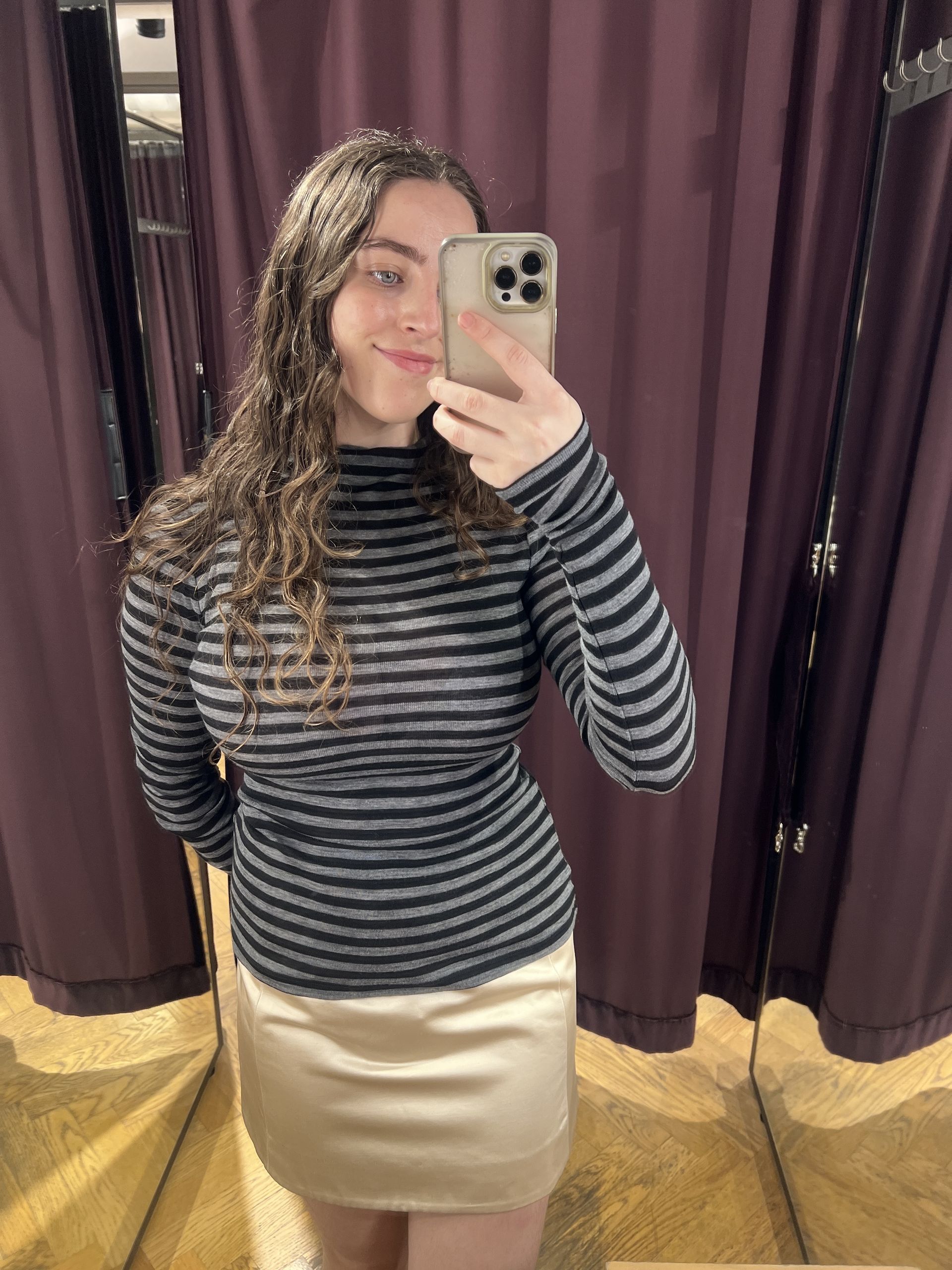 An image of Who What Wear's Ava Gilchrist wearing one of the best turtlenecks from &amp; Other Stories.