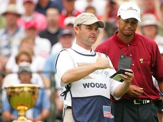 Tiger Woods and Billy Foster plotting their next shot