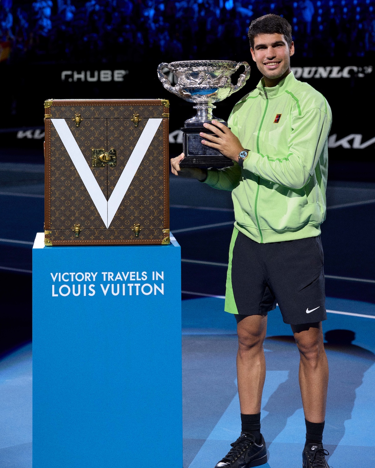 Carlos Alcaraz with Australian Open and trunk