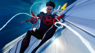 Miles shooting webs on top of a moving train in Spider-Man: Across The Spider-Verse.