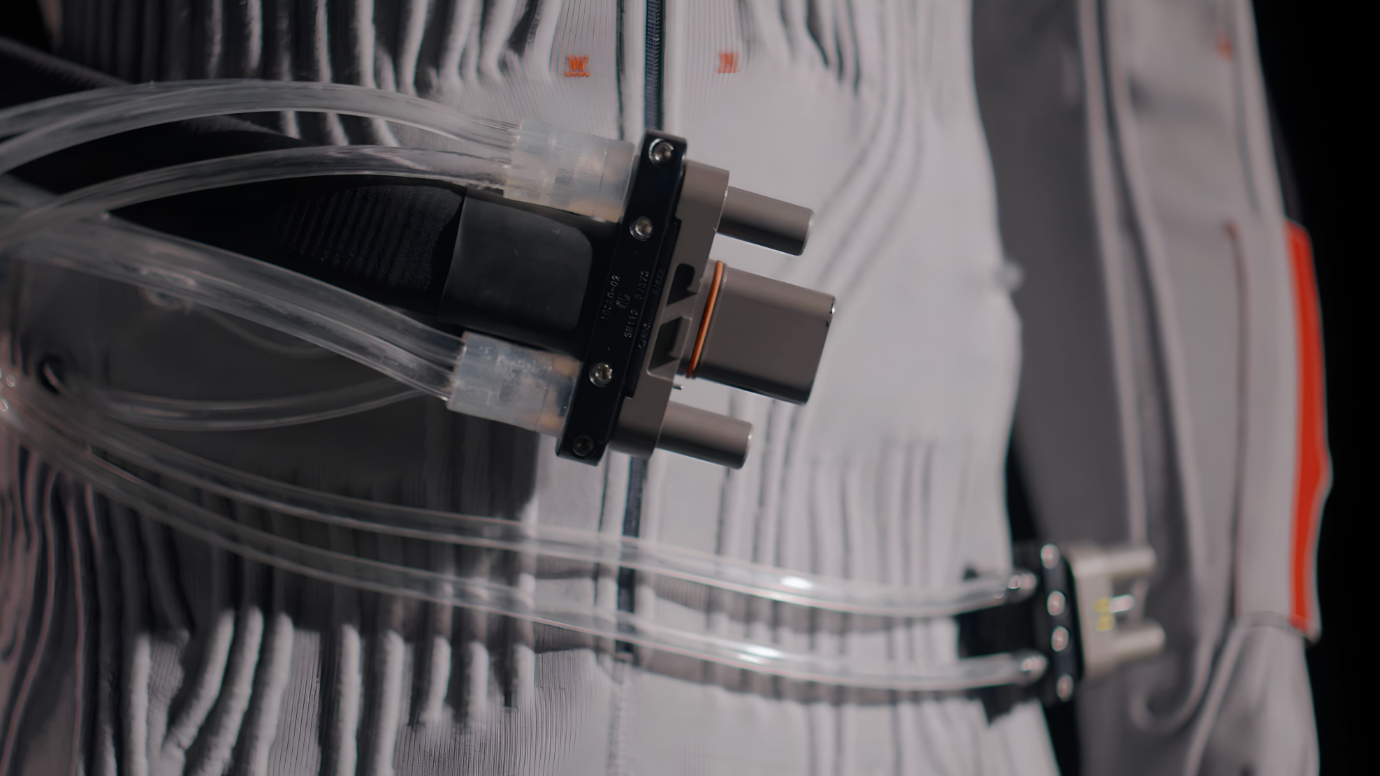 A close up of liquid cooling tubes running through an Axiom spacesuit undergarment.