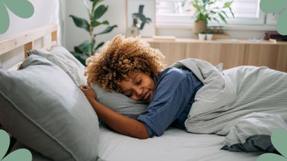 What is the ideal temperature for sleeping? image of woman sleeping in bed
