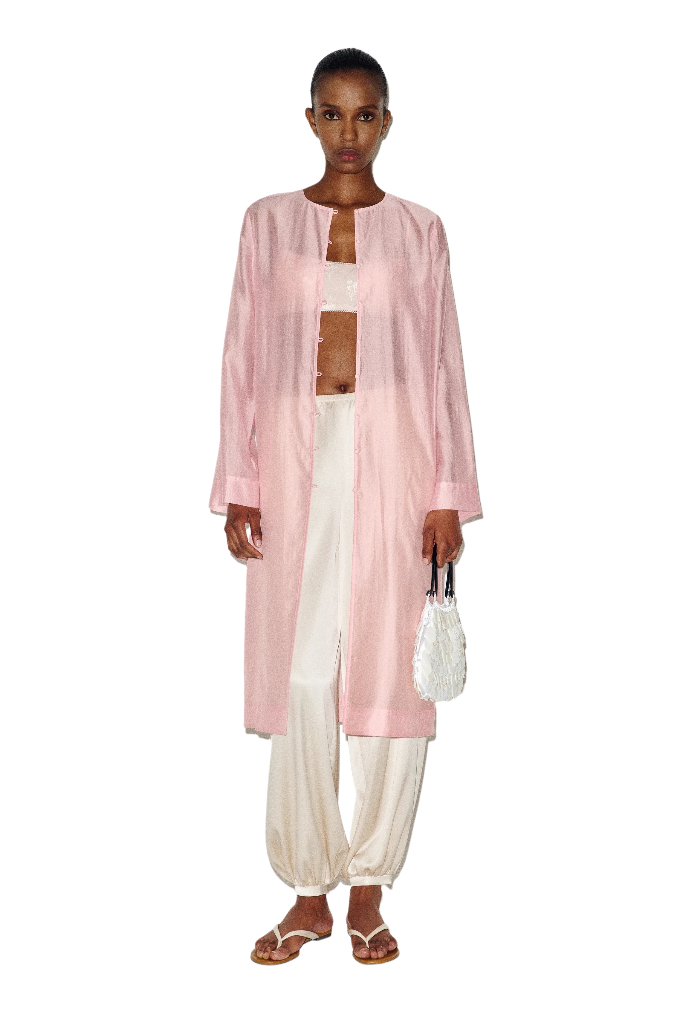 Sheer pink duster.
