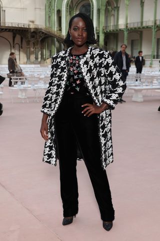 Lupita Nyong'o attends the Chanel Paris Womenswear Spring-Summer 2025 show