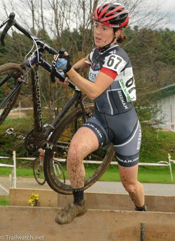 Catherine Sterling (Bikeman.com) sprinting over the barriers.