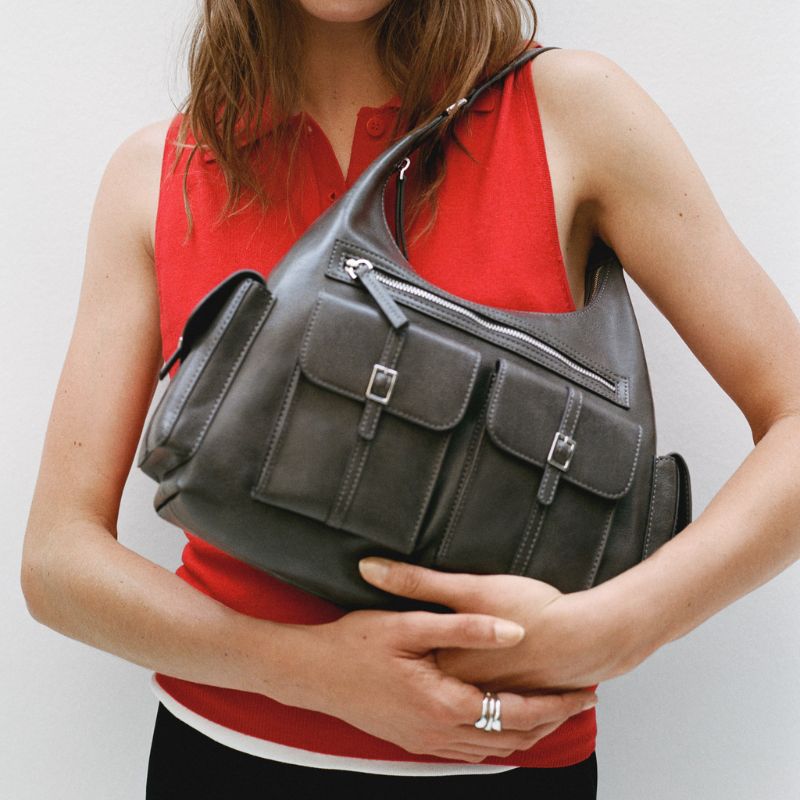 Shoulder Bag With Cargo Pockets held by model