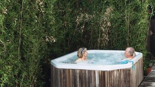 Backyard hot tub privacy ideas: image of bamboo growing around hot tub