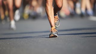 a runner's lower legs and feet