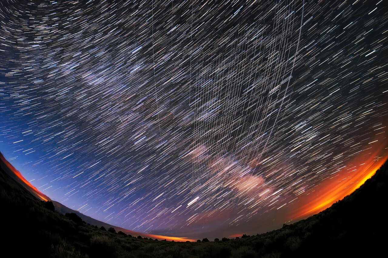 Starlink Satellites pass overhead near Carson National Forest, New Mexico, photographed soon after launch.