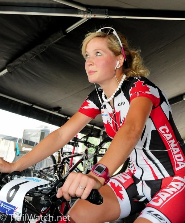 Canadian Emily Batty, one of the Under 23 race favorites, warms up on a trainer in the Trek World Team tent