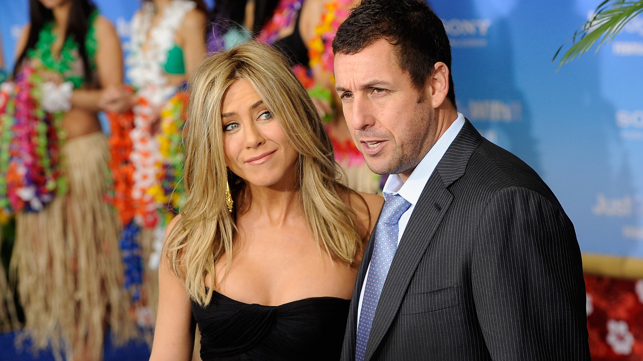 Actors Jennifer Aniston and Adam Sandler attend the premiere of &quot;Just Go With It&quot; at Ziegfeld Theatre on February 8, 2011 in New York City.