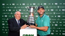Marco Penge is presented with the Spanish Open trophy after his win in 2025