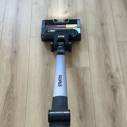 Shark Stratos Cordless Vacuum on wood-effect flooring