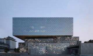 Guardian Art Center, China, by Buro Ole Scheeren. A large rectangular structure with lights all over it.