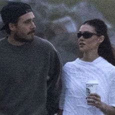 Nicola Peltz Beckham broke her public silence in the poncho trend, flared jeans, and ballet flats