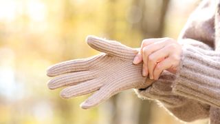 woman wearing gloves