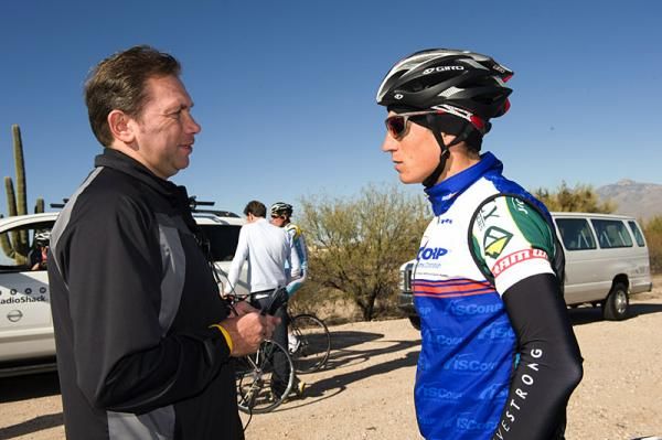 Johan Bruyneel chats with team newcomer Matt Busche before the ride.