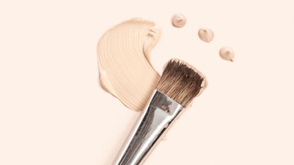 Makeup brush with smudge of foundation