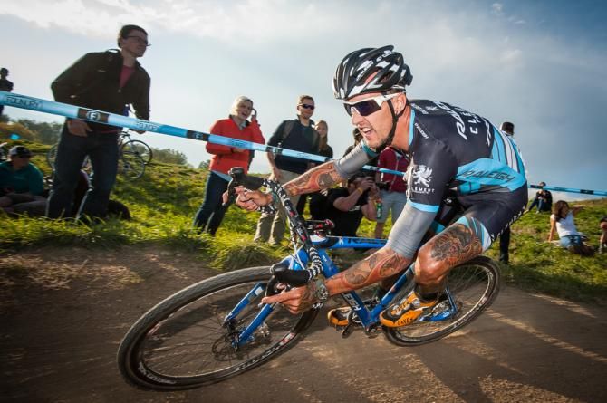 Ben Berden (Raleigh Clement) staying close to Powers (Rapha Focus) wheel on the descent. Boulder Cup.