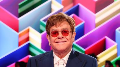 When is Elton John's farewell tour, what's his real name, and how many hits did the music legend have?