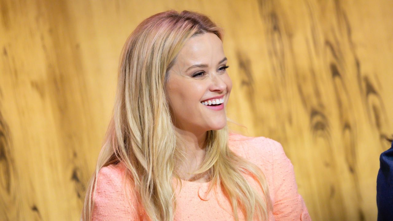 picture of Reese Witherspoon smiling at event