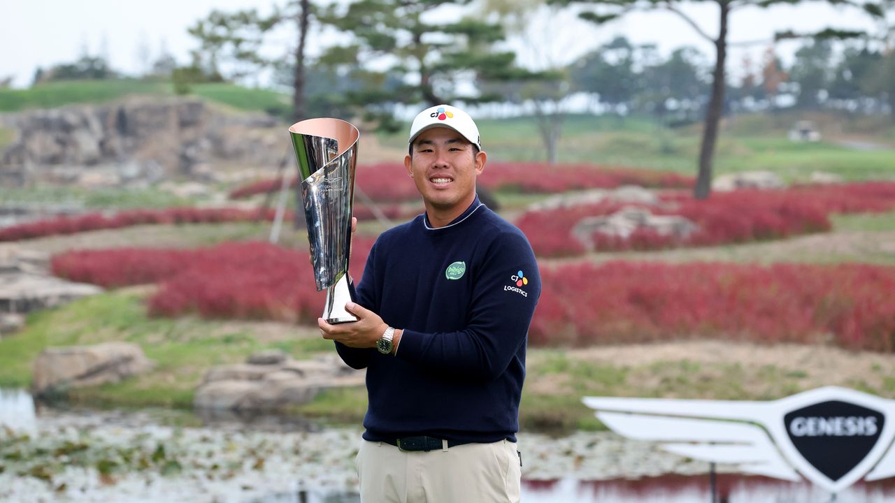 Byeong Hun An holds the 2024 Genesis Championship trophy