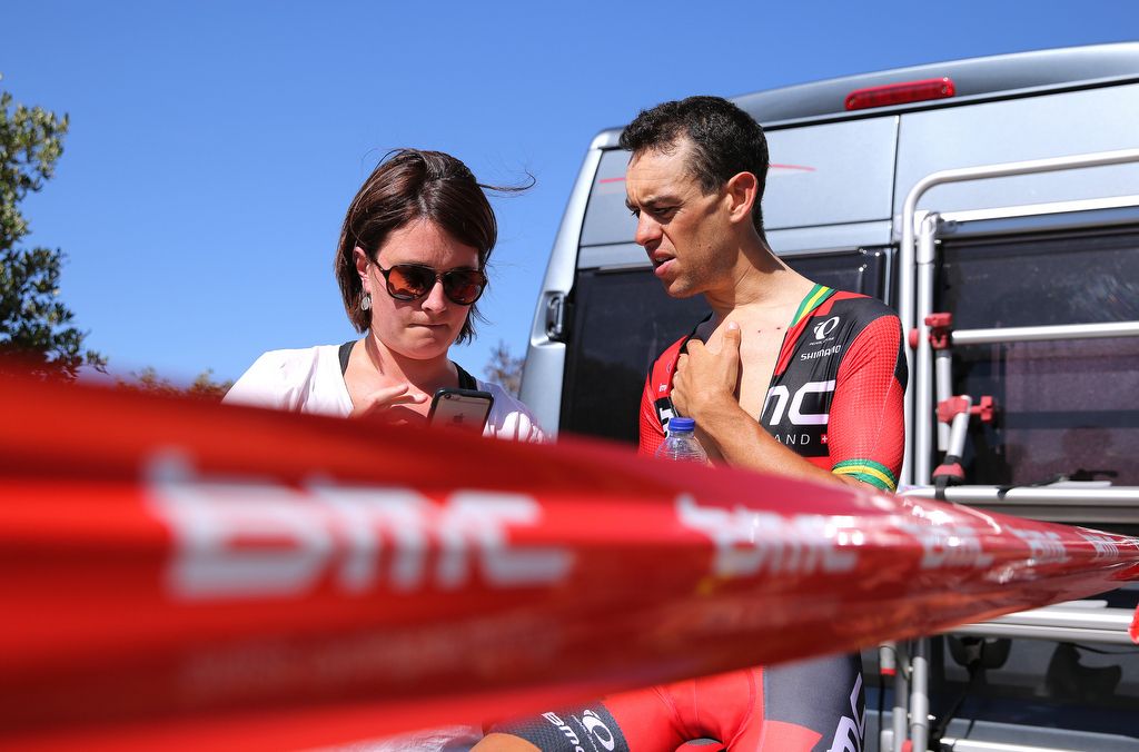 Richie Porte warms down and recives updates on his ride from BMC's media officer Phoebe Haymes