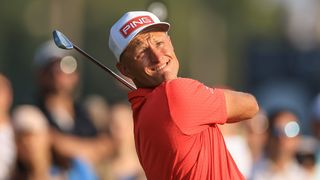 Adrian Meronk takes a shot at the Dubai Desert Classic