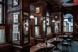 Interior view of seating in the Audley pub in Mayfair