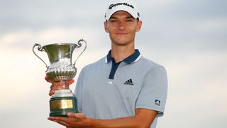 Nicolai Hojgaard with the trophy after winning the 2021 Italian Open