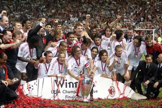 Milan celebrate with the Champions League trophy, 2003