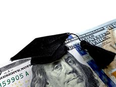 Hundred dollar bill with graduation cap