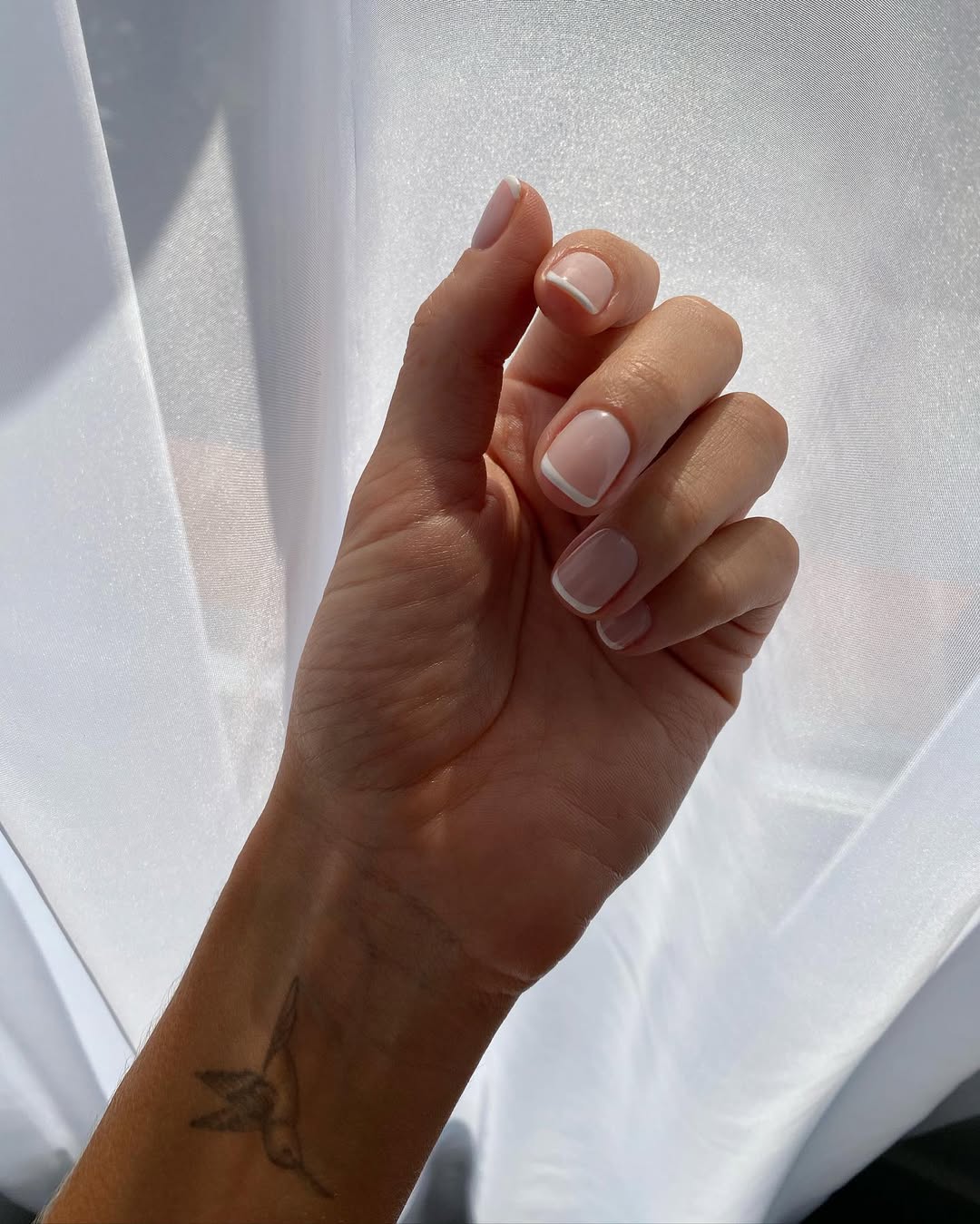 Chic French tip design on short nails