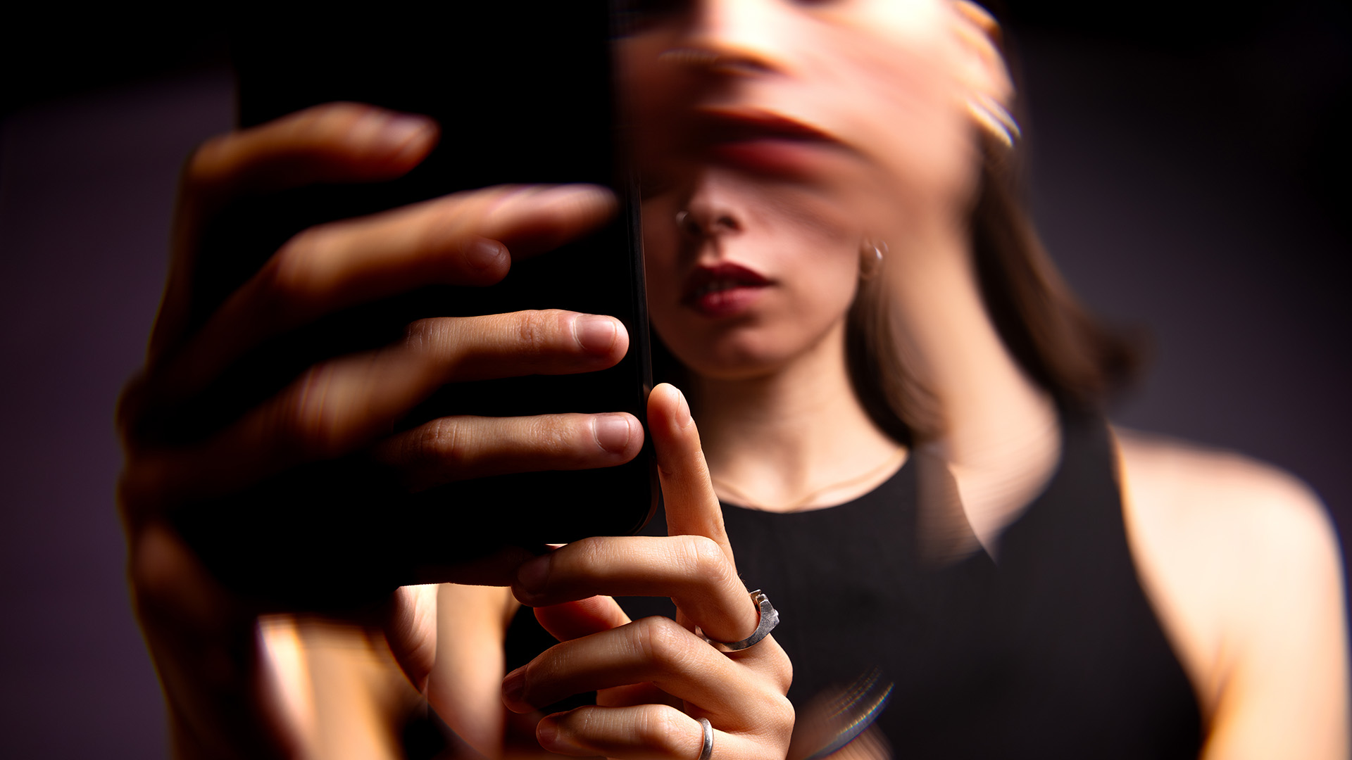 Woman doomscrolling on her phone