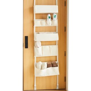 White, cloth over-the-door organizer