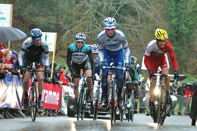 R&eacute;mi Cusin, Florian S&eacute;n&eacute;chal, Anthony Geslin and Christophe Le M&eacute;vel suffer in the difficult racing conditions of western France