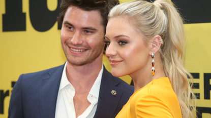 Chase Stokes and Kelsea Ballerini pose at the opening night of the new musical "Shucked" on Broadway at The Nederlander Theatre on April 4, 2023 in New York City