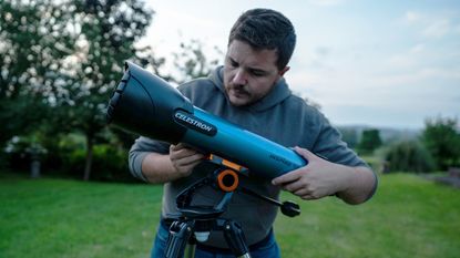 man using the Celestron Inspire 100AZ