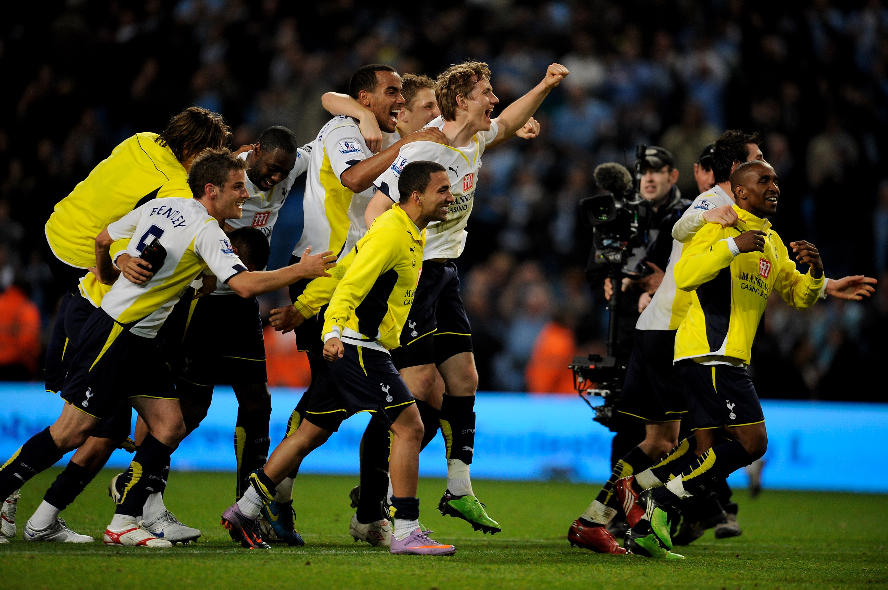 Tottenham players celebrate securing Champions League qualification after a win away to Manchester City in May 2010.
