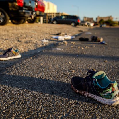 Asphalt, Footwear, Road surface, Shoe, Road, Shadow, Street, Sand, Tar, Litter,