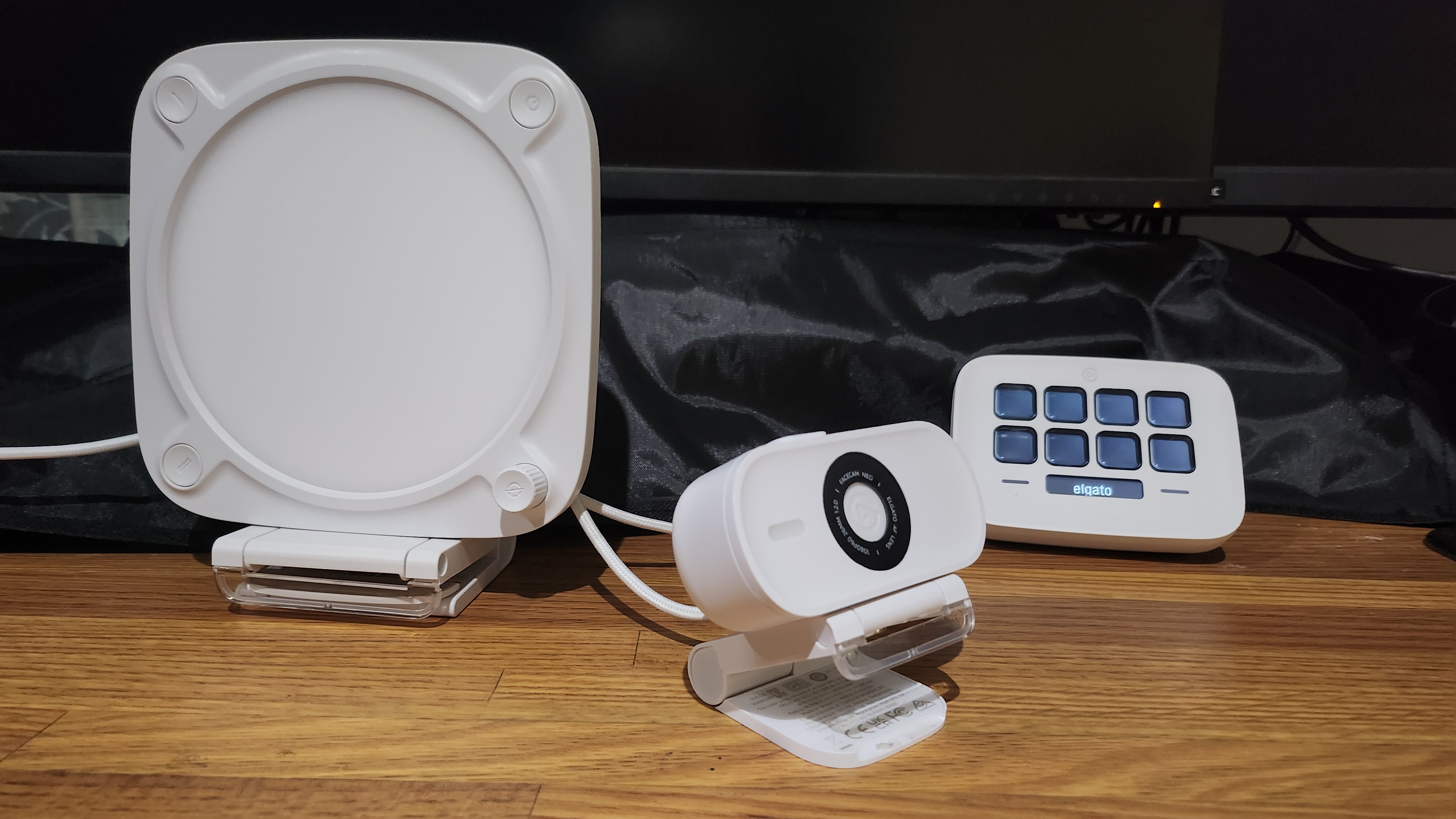 Elgato Facecam Neo placed on a desk.