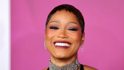 keke palmer on a pink background