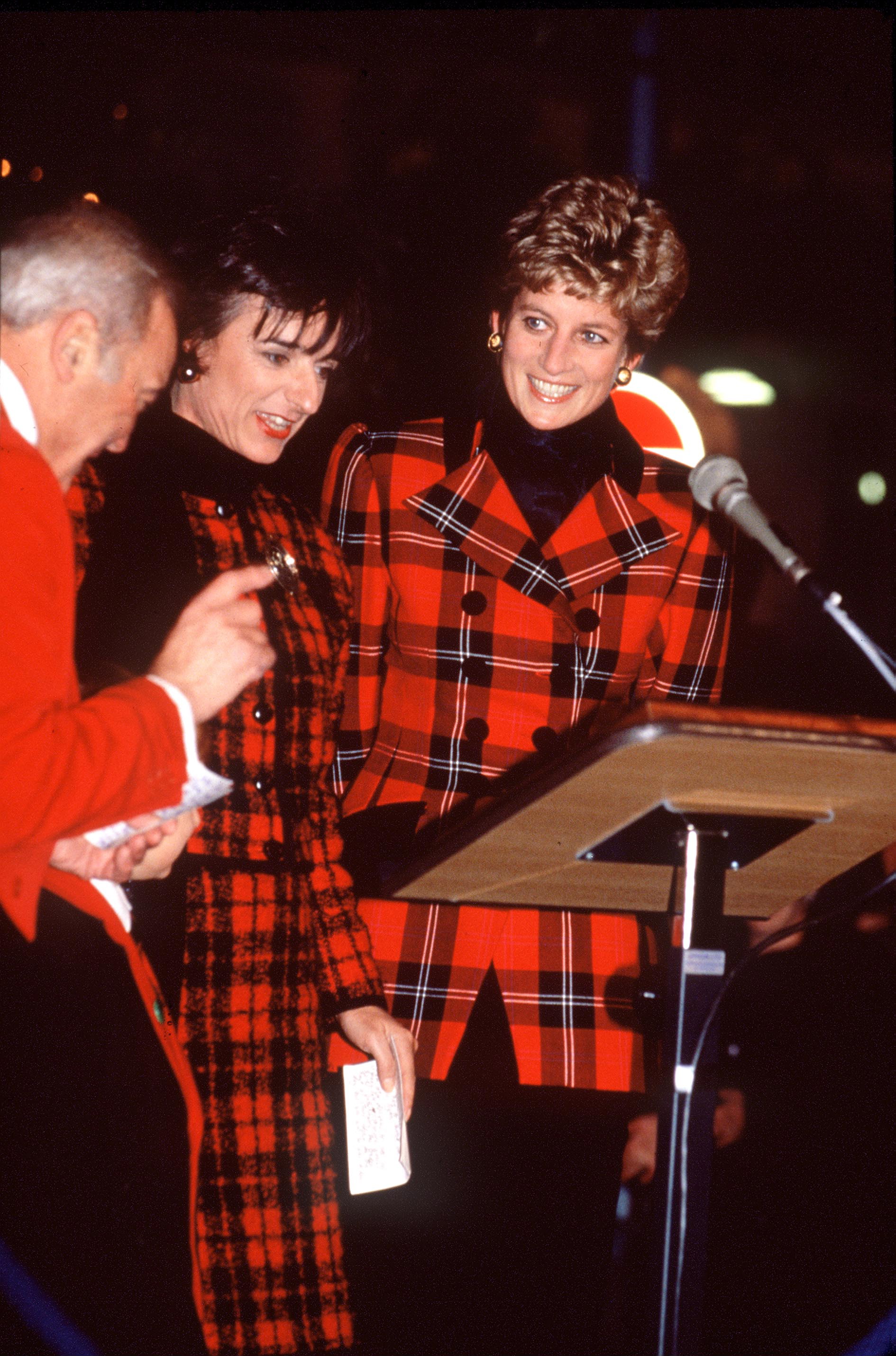 UNITED KINGDOM - NOVEMBER 17: Princess Diana With Rosa Monckton Turning On The Bond Street Christmas Lights In London. Both Diana And Her Friend Are Wearing Red Tartan Outfits. The Red Tartan Jacket Worn By The Princess Is Designed By Bellville Sassoon. (Photo by Tim Graham Photo Library via Getty Images)