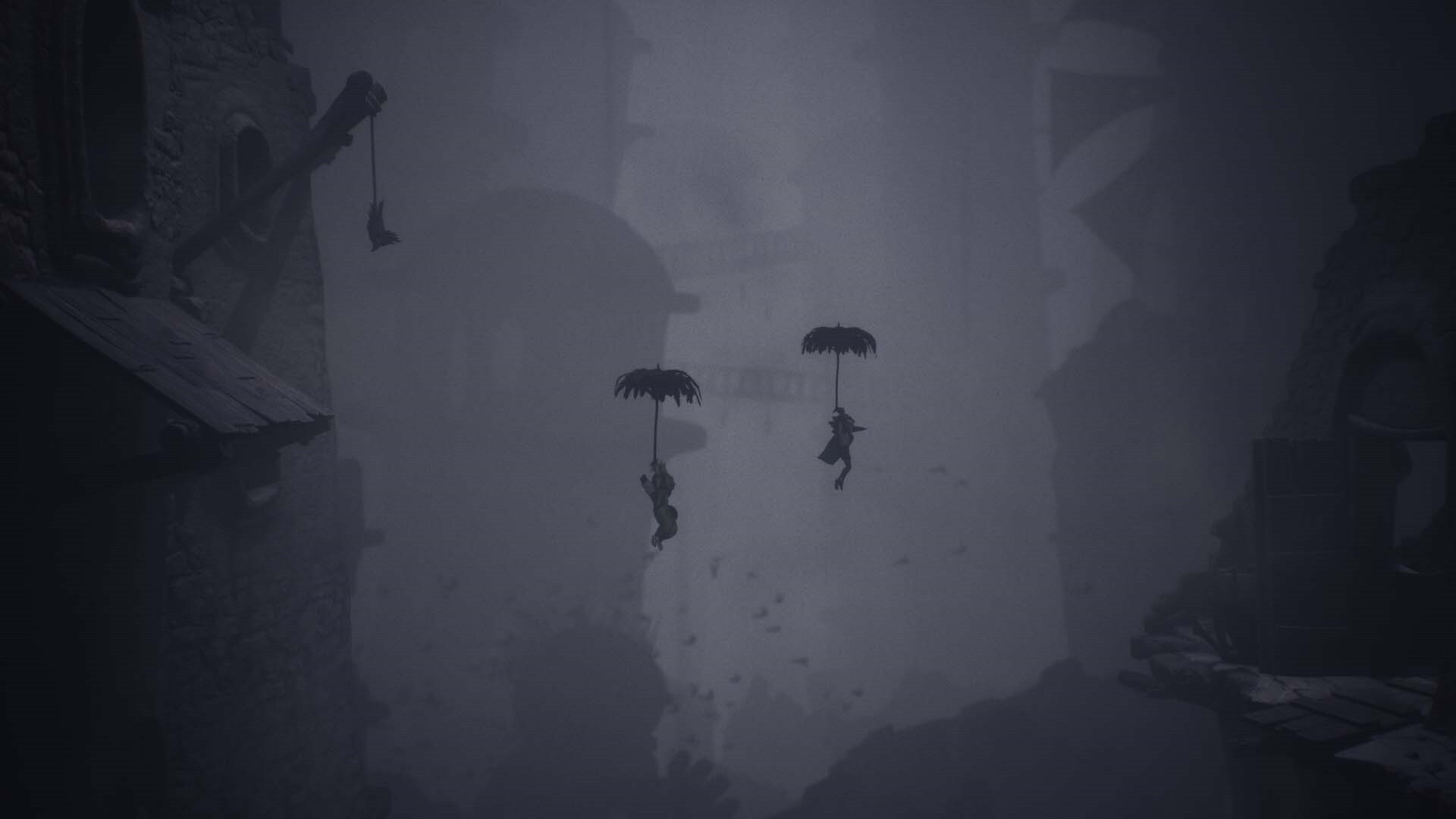 Alone and Low float between buildings on little umbrellas in Little Nightmares 3